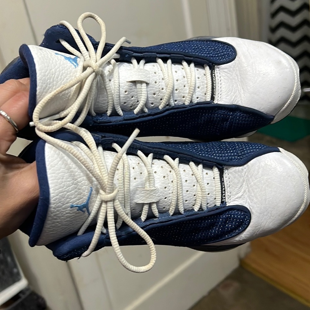 Size 4y flint jordan 13s they are in great condition jst need a lil wipe